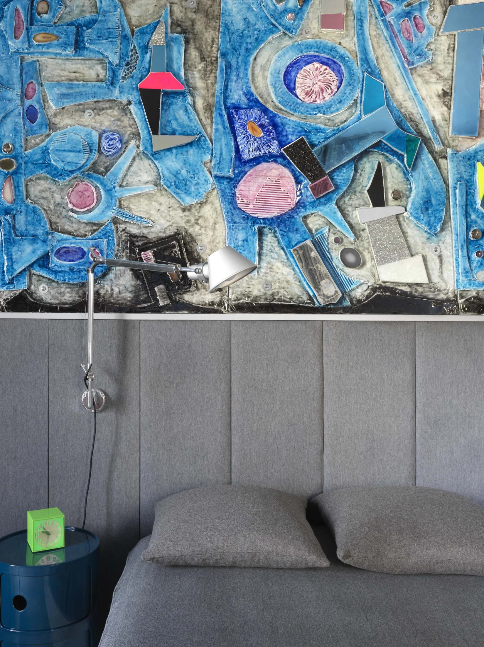 The custom wall panels Doug designed and made from glazed ceramic to express his feelings about the colour grey.