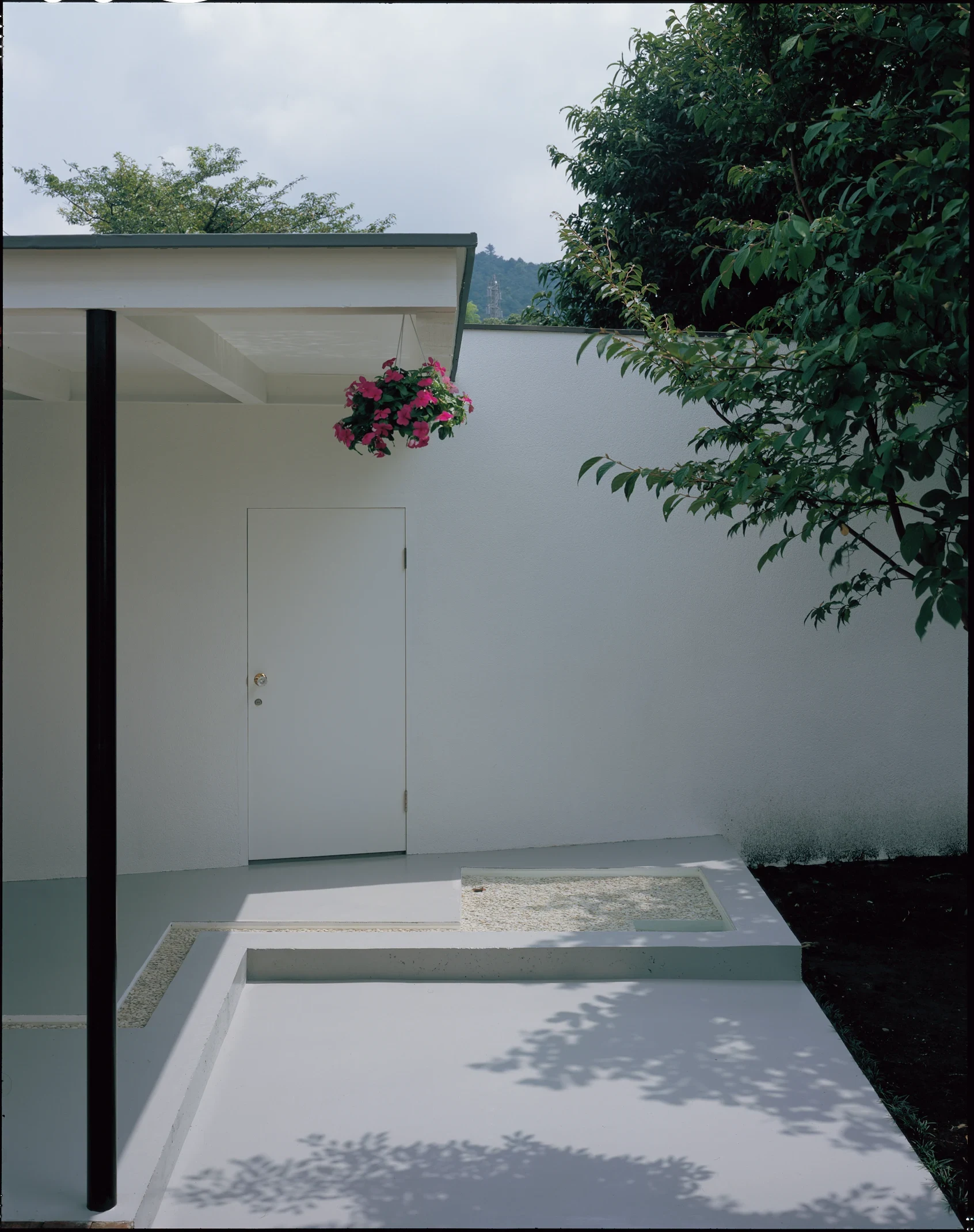 Spring Water Pavilion (2004) near Mount Fuji, welcomes spring water in to flow through a concrete channel, cooling the floor in in the hotter months. Image: TANK Co., Ltd and Kozo Takayama.