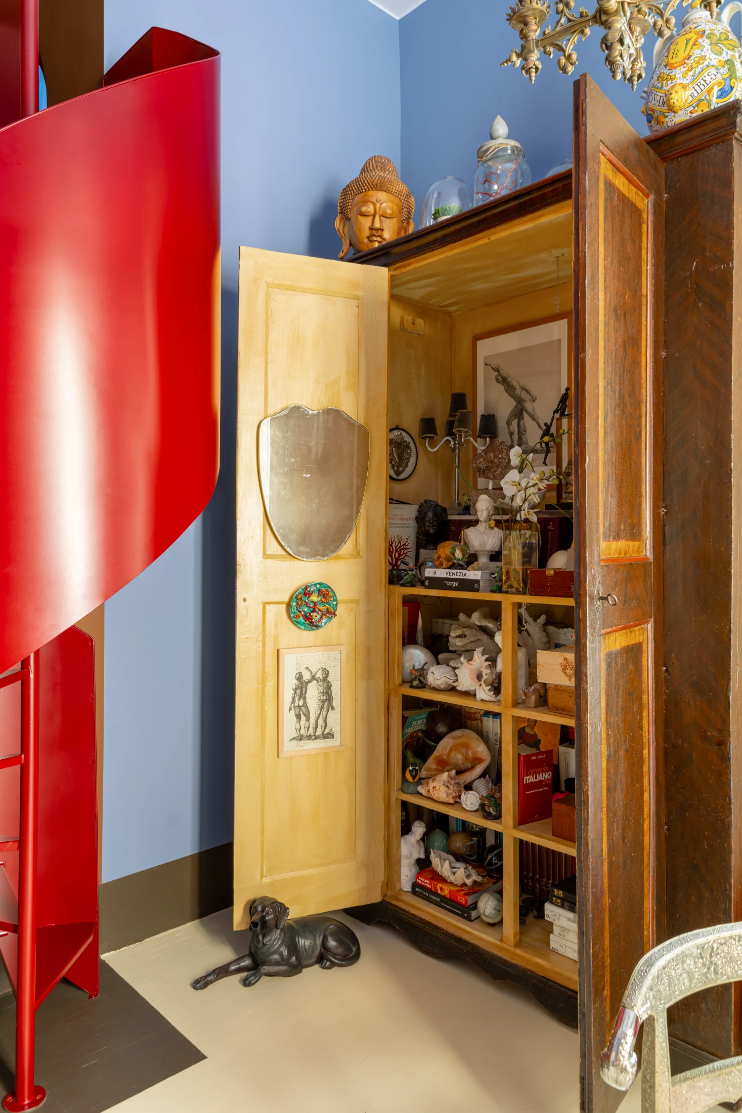 The cabinet located in the medical office houses much of Nicola and Chicco's personal antique collection – a Cabinet de Curiosités.