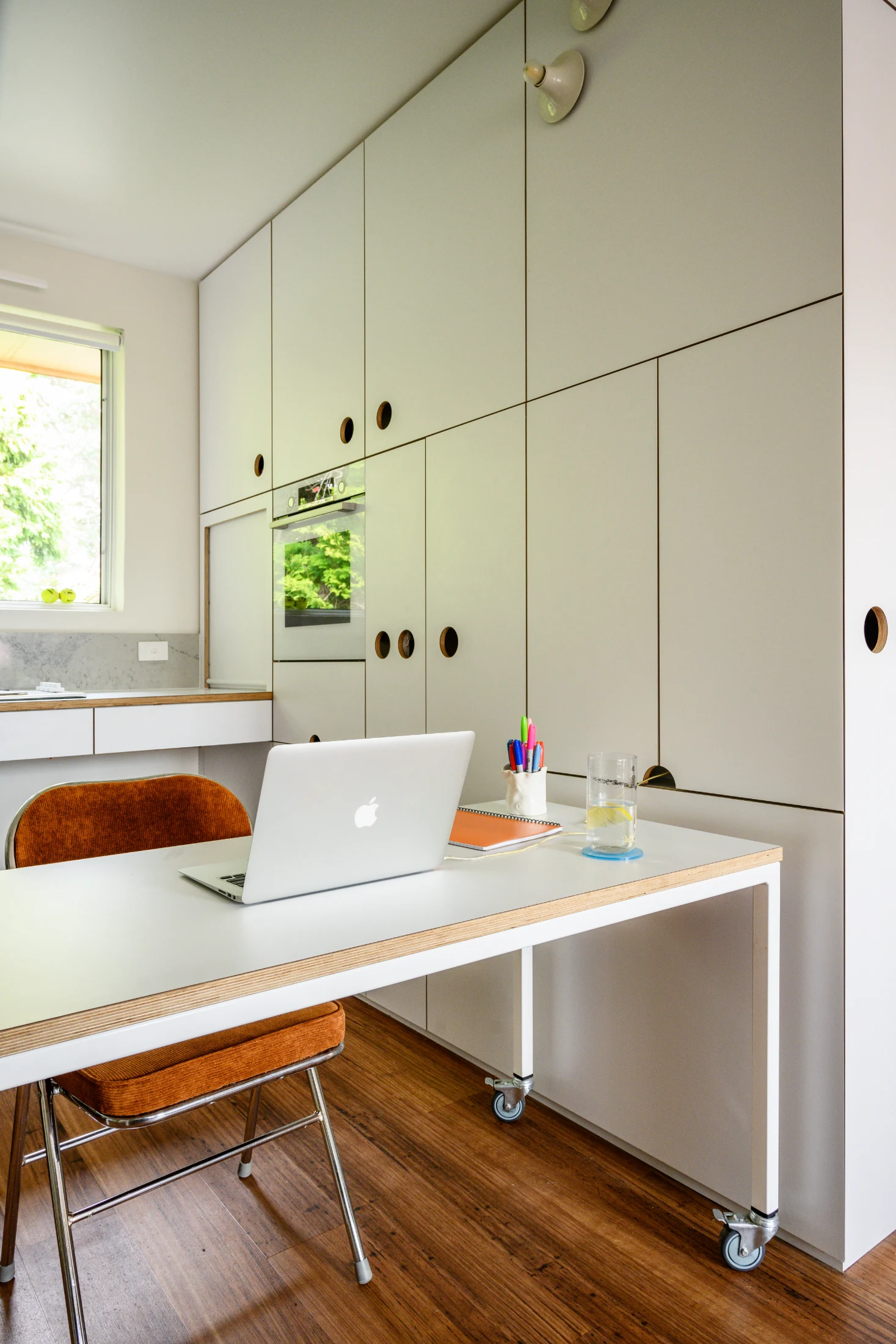 The pull-out dining table often Kirthana's base when she works from home.