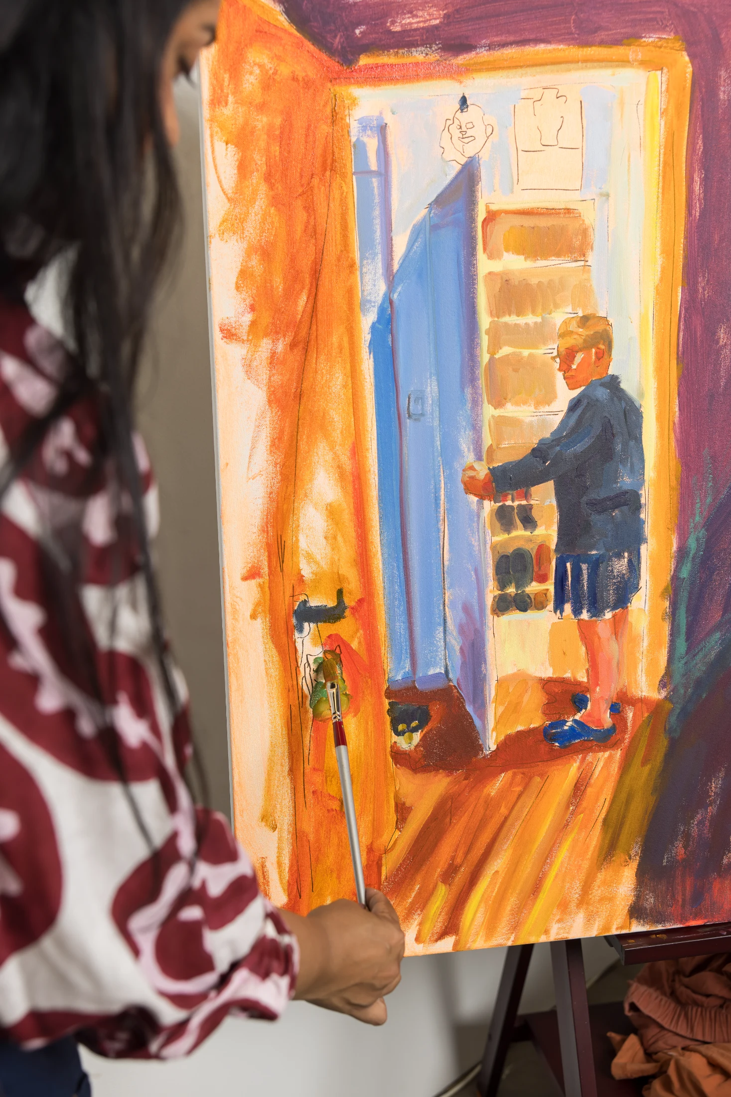 Kirthana attending to details of an early work-in-progress.