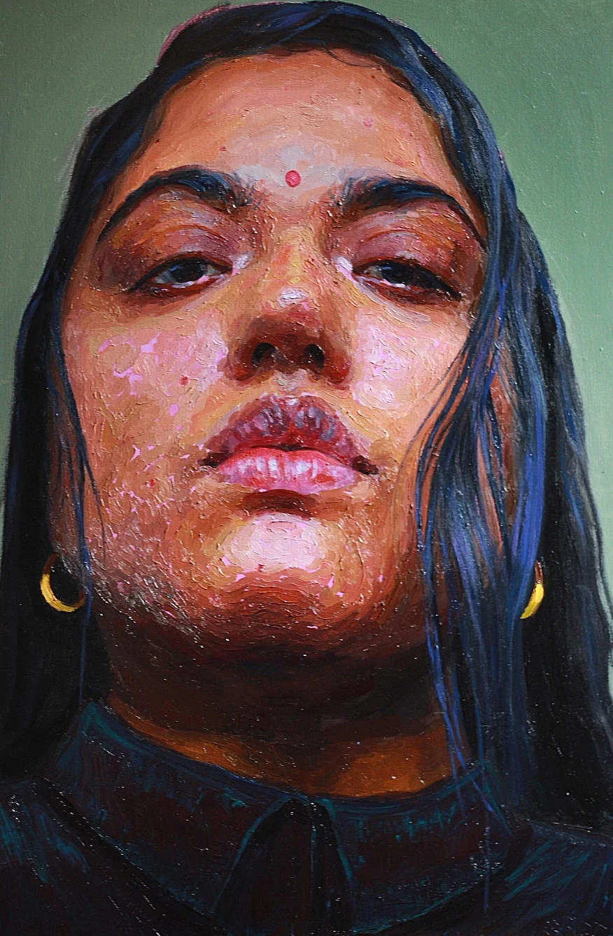 Details from Kirthana's studio space in Sydney including one of several portraits she has painted of artist, friend and mentor, Ramesh Mario Nithiyendran.