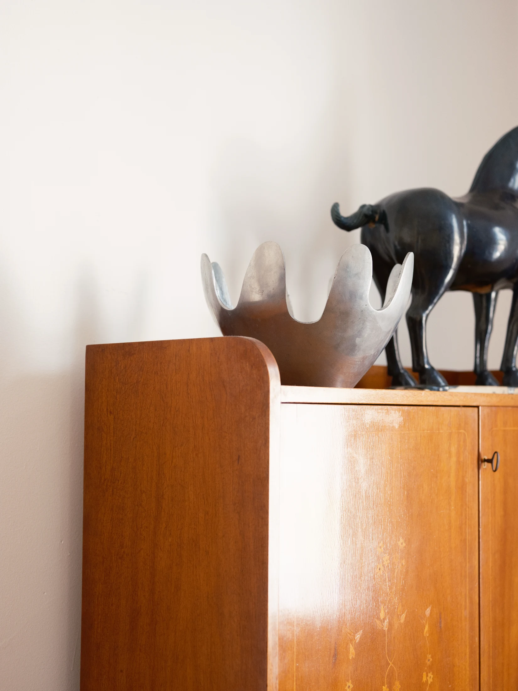(Top right) The inexpensive metal bowl that has prompted Ben to consider launching his own line of vases and other decorative pieces.