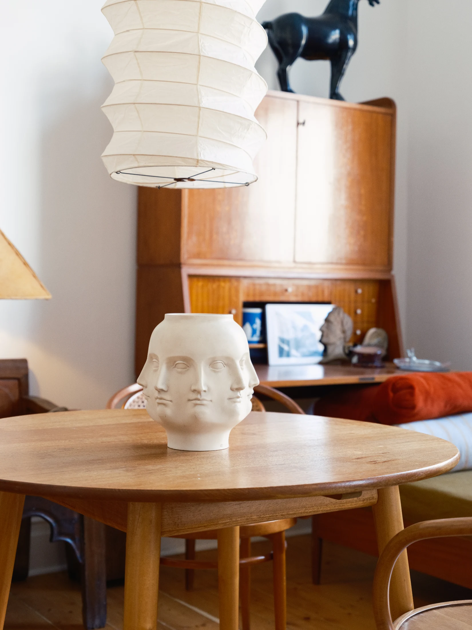 (Top left) Ben's 'face vase' upstairs in his home is something that people