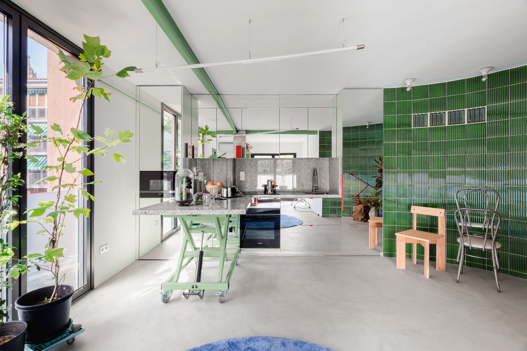 The mirrored kitchen was designed to