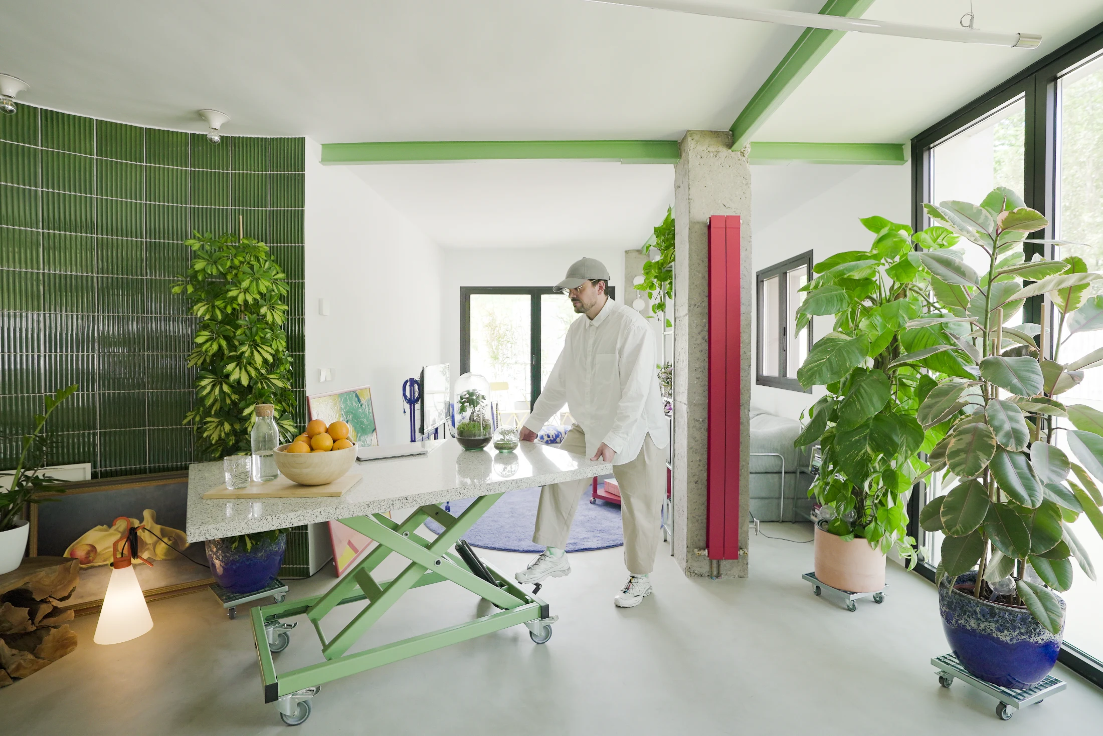 The apartment's flexible furniture pieces tie in with the project's adaptable nature. The height-adjustable table can be reconfigured to suit a range of needs and uses of the space. Image: Alejandro Fabbri.