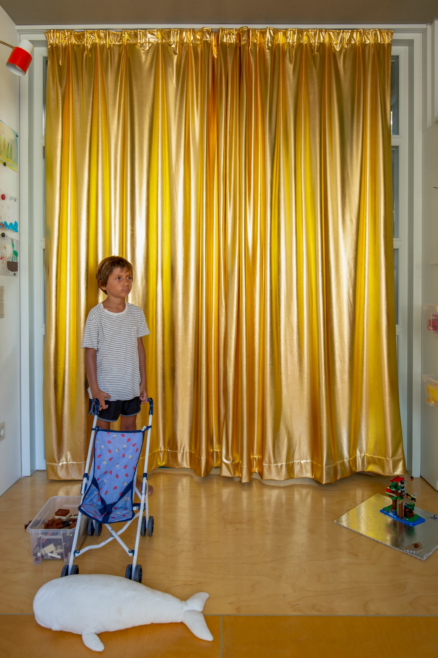 Marianna and Konstantinos's son Ikaros upstairs in the family home, Petralona House. Image: Alina Lefa.