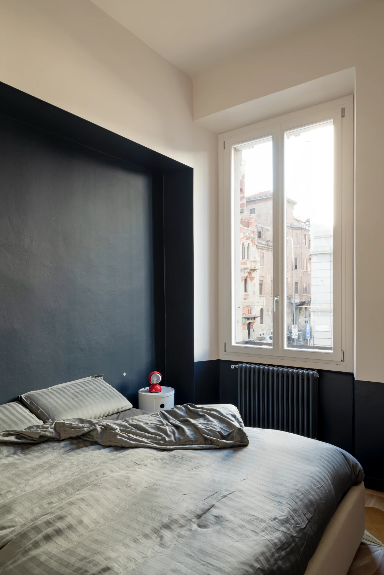 The bedroom's walls are