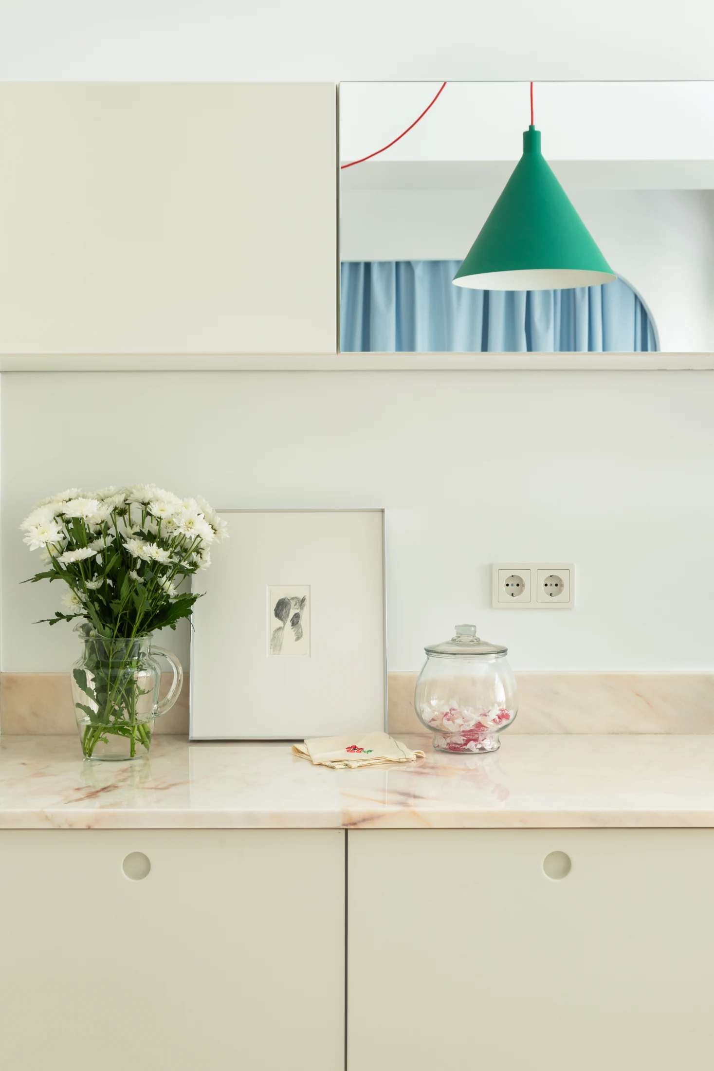 The kitchen's Portuguese pink marble benchtop was carefully selected to
