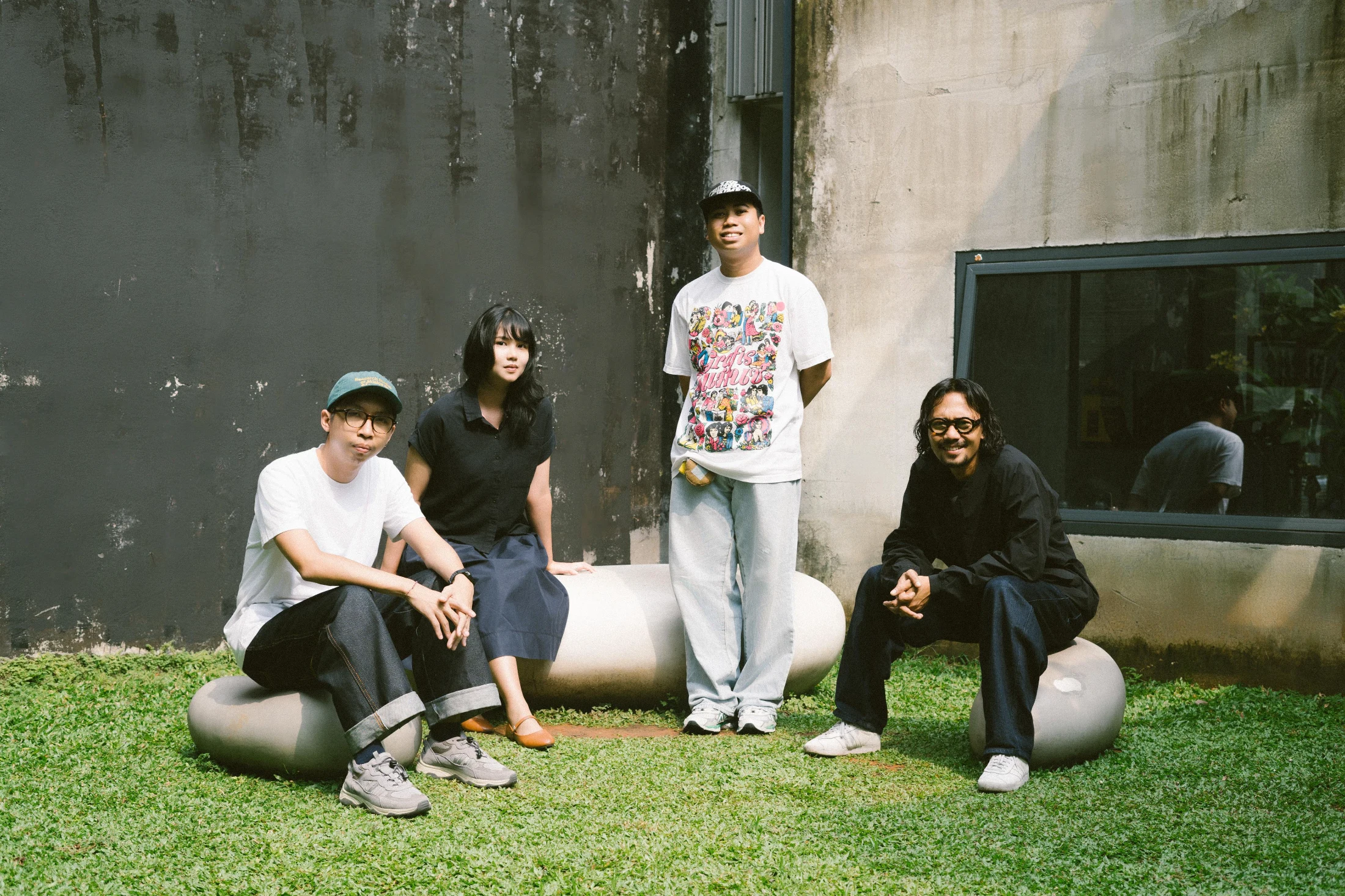 Grafis Nusantara's team from left to right: Hendri Siman, Rakhmat Jaka, Claudia Novreica, Sulaiman Said.