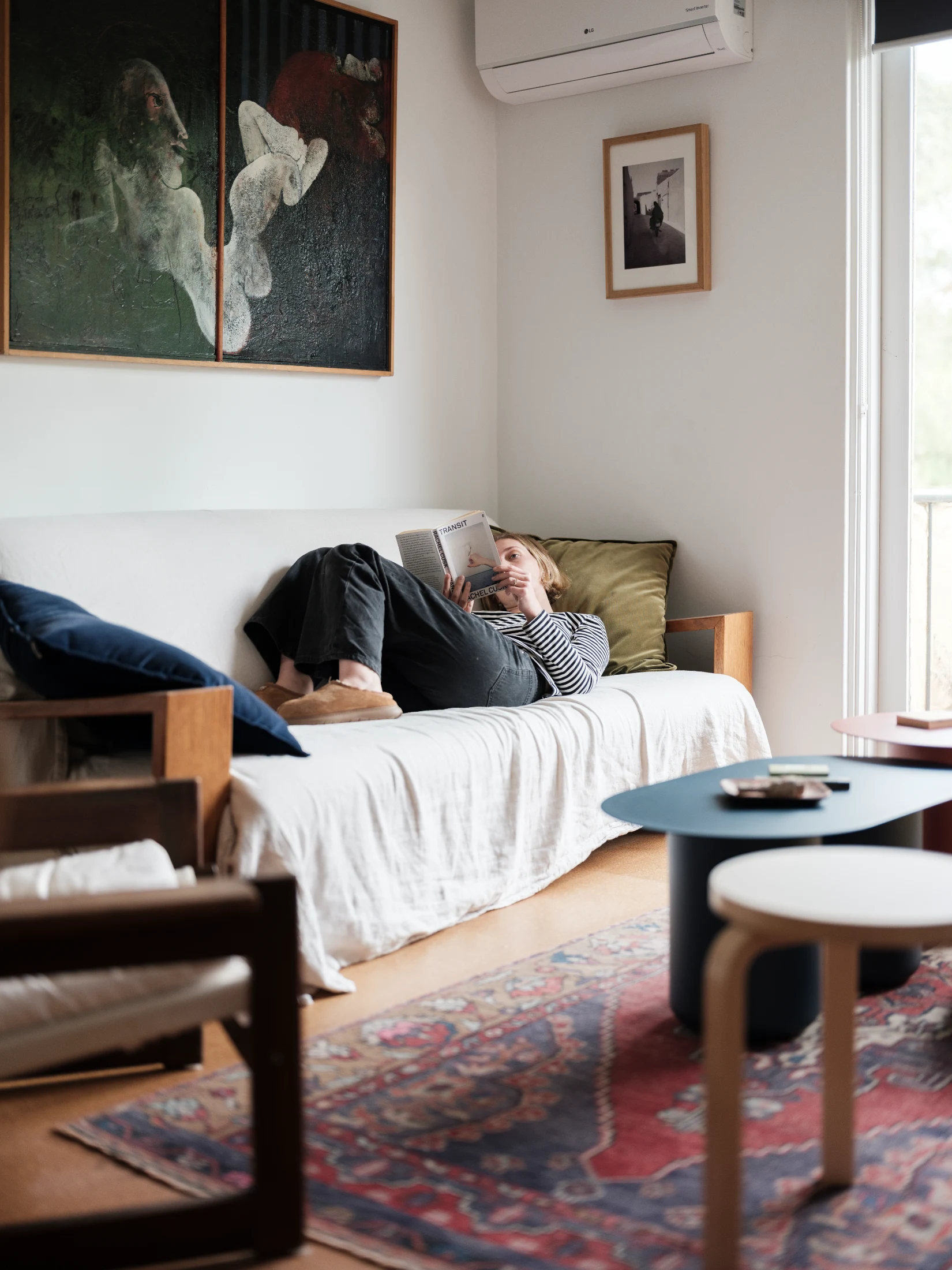 The living space's peaceful and cosy atmosphere includes paintings from favourite artists, and a handmade carpet bought in Turkey.