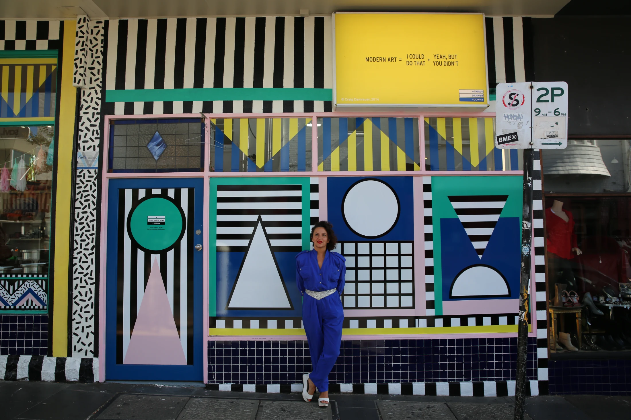 Camille pictured in front of one of Third Drawer Down's store fronts in Prahran, Melbourne back in 2014. Image courtesy of Camille Walala.