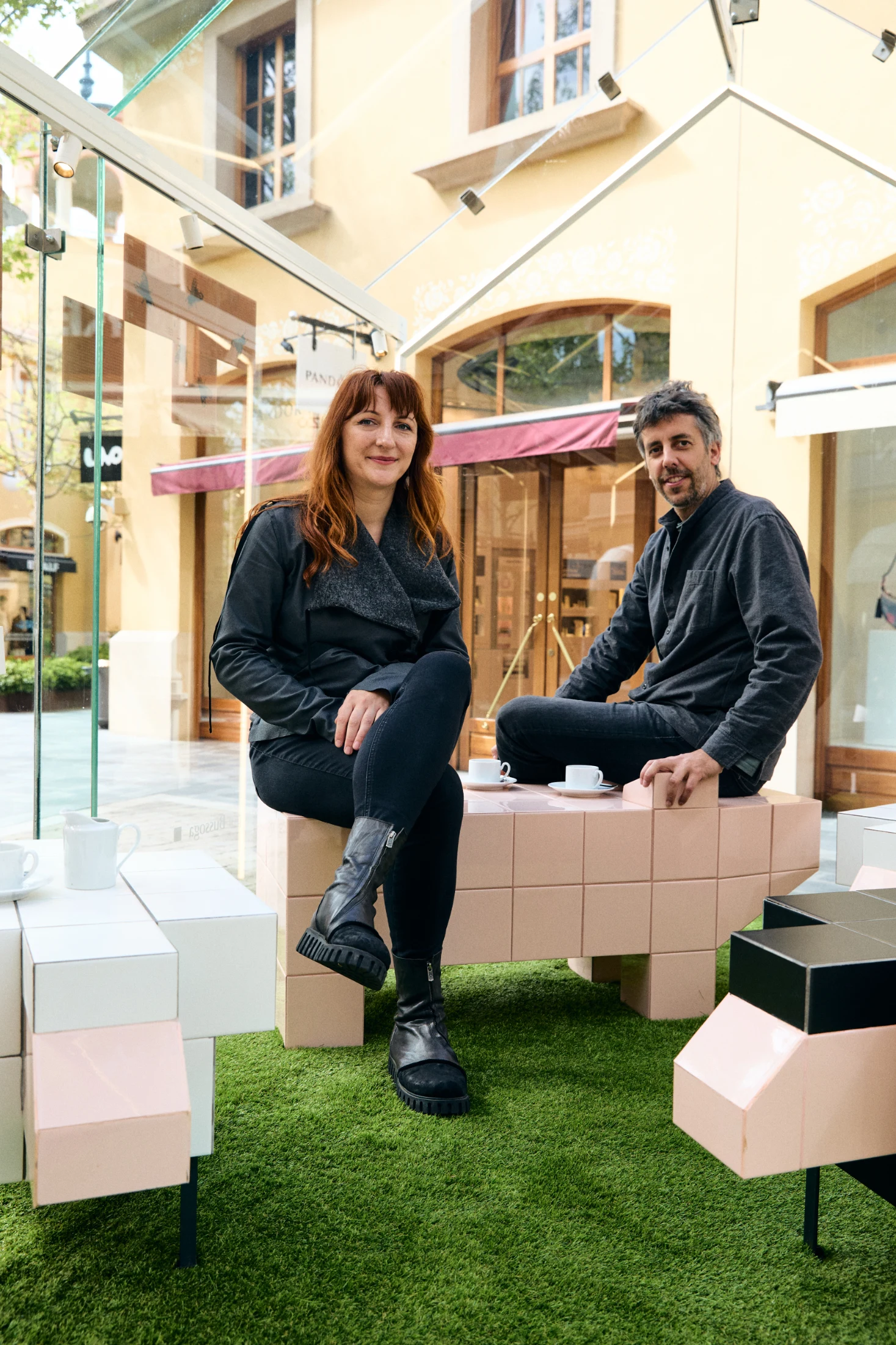 The duo behind Bussoga's tile designs: Irina Grosu (left) and Josep Motas (right).