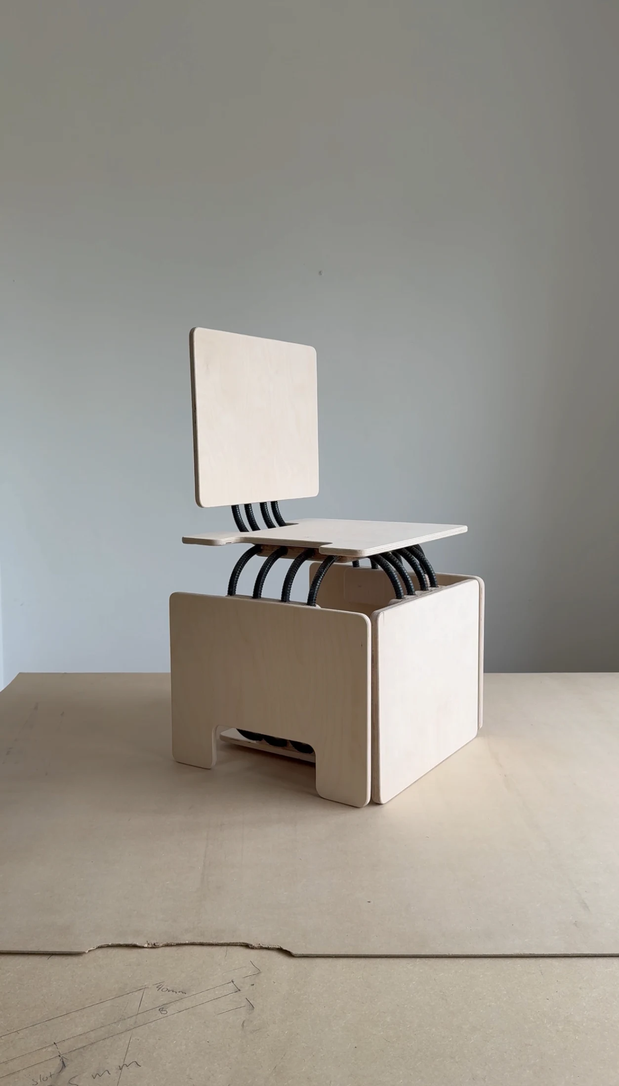 Nude Modular's Cube Concept can expand and fold from a compact stool/side table into a chair or a bench seat.