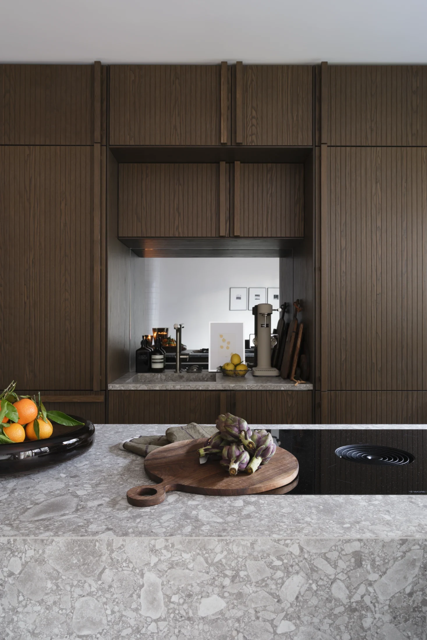 Jean-Malo's contemporary take on the dark timber seventies kitchen.
