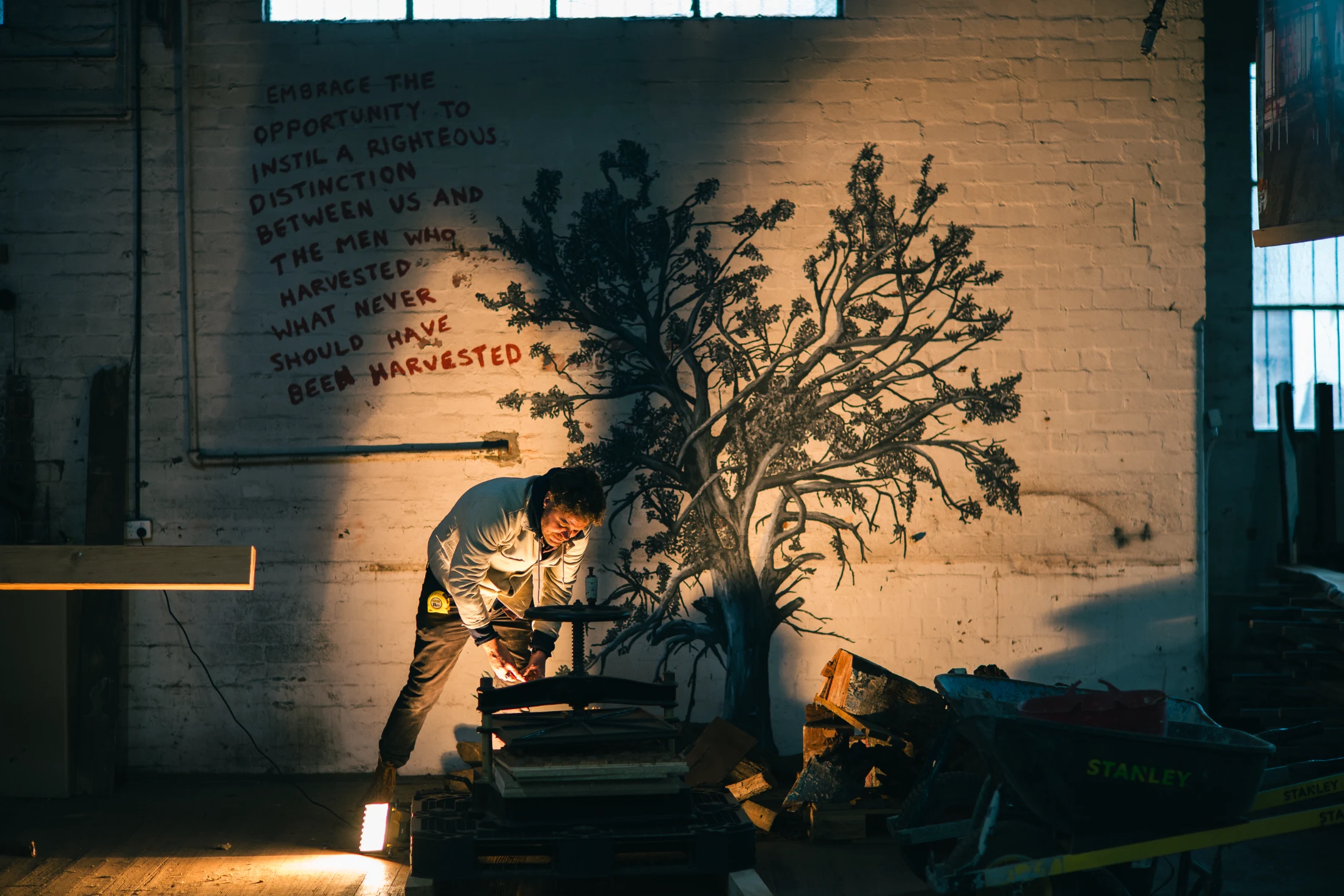 Proclamations and manifestos appear in spray paint and artworks throughout Revival's workshop space. It's all part of how Robbie engages visitors in the issues and the role they can play in helping to fix them.