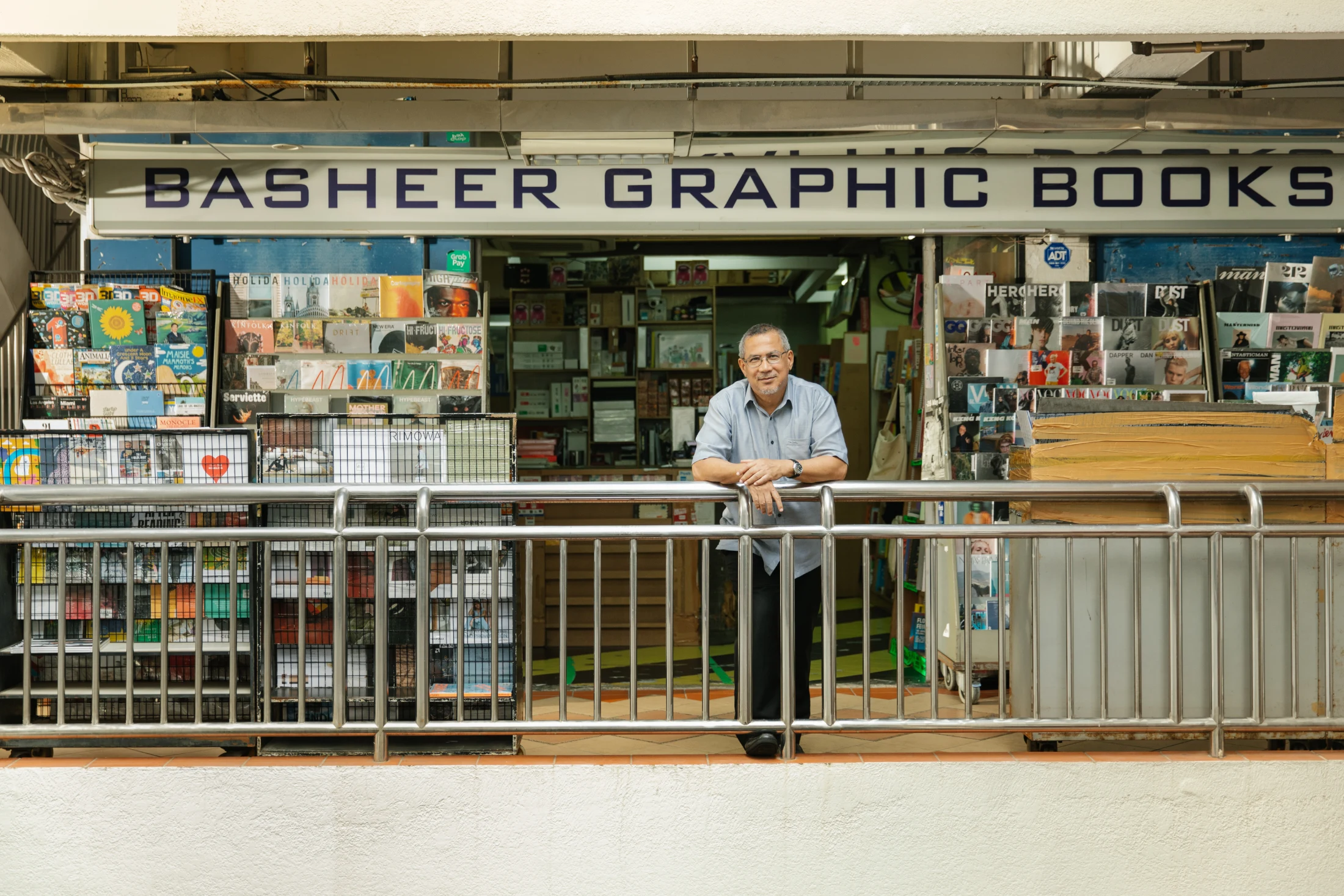 A curation of some of the world's best-known and most obscure magazine titles flank the entrance of Basheer Graphic Books.