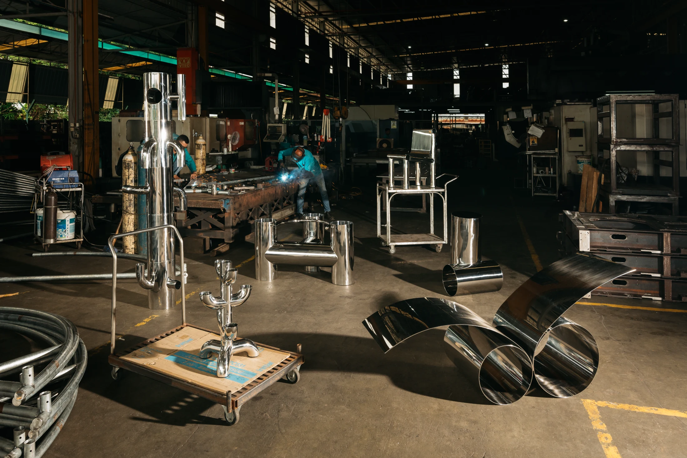 Artistic designs made from polished stainless steel pipes and sheets, the reflective surfaces in Yong’s 10-piece collection Being and Nothingness ‘become metaphors for self-examination’. Image: Nathan Yong Design.