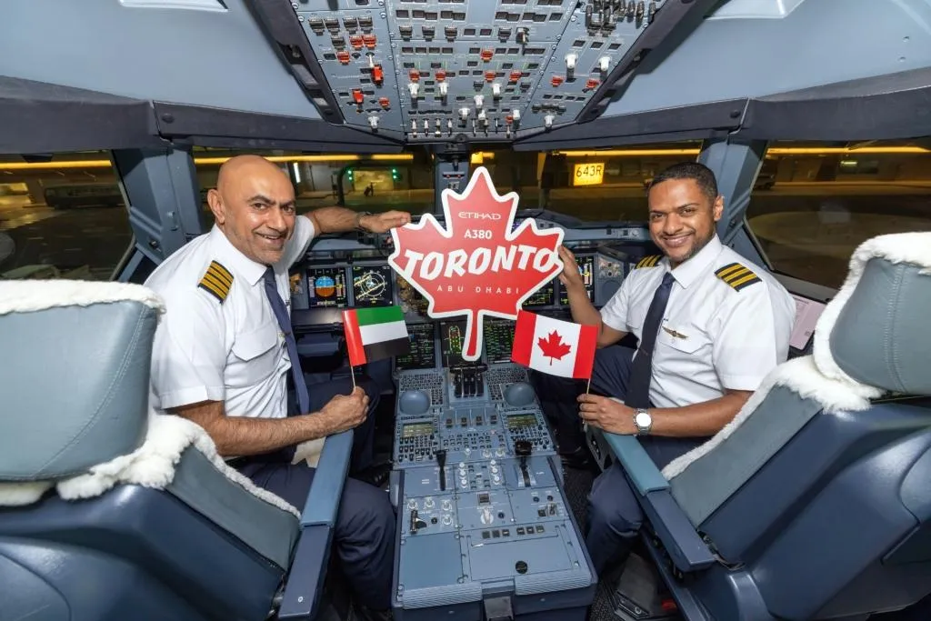 Etihad pilots celebrate landing in Toronto with the Airbus A380