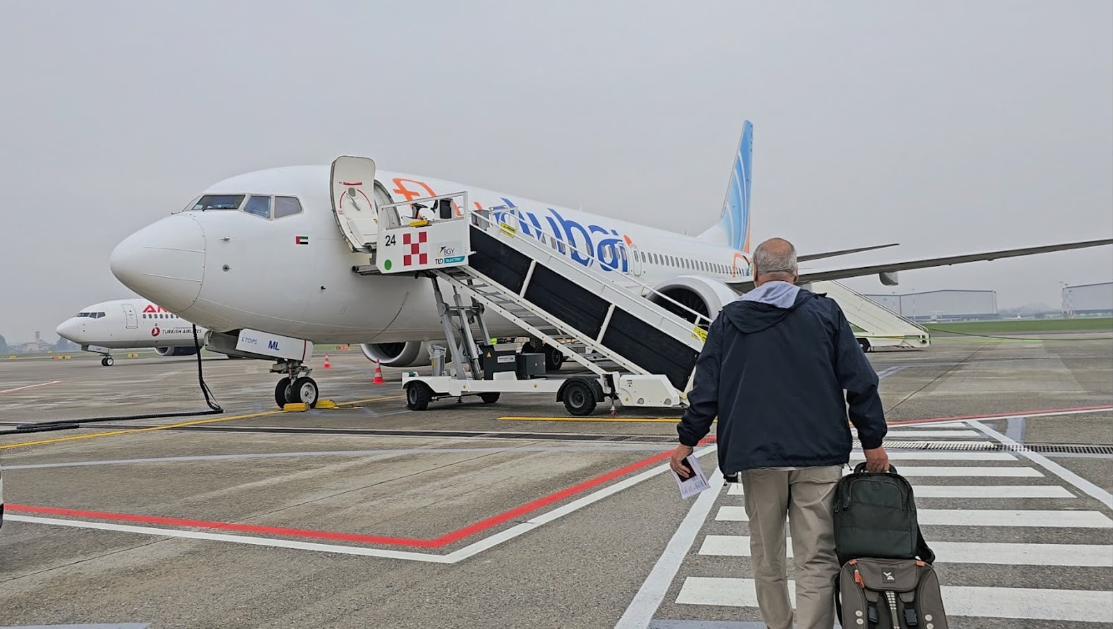 Boarding A6-FML. Photo: Lorenzo Giacobbo/ Airways