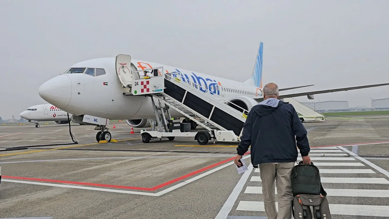 Boarding A6-FML. Photo: Lorenzo Giacobbo/ Airways