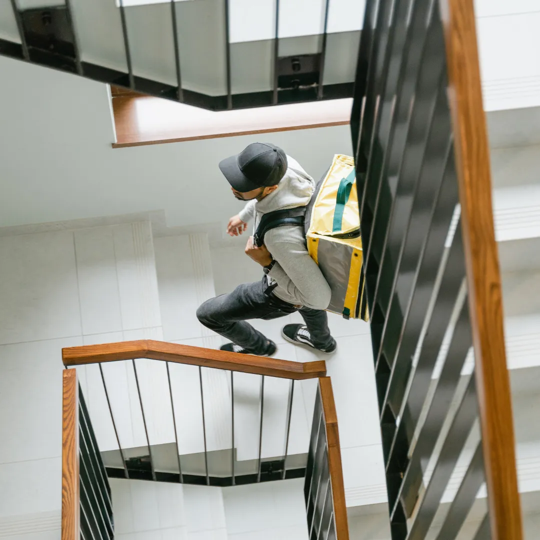 Delivery Man Going Up Stairs
