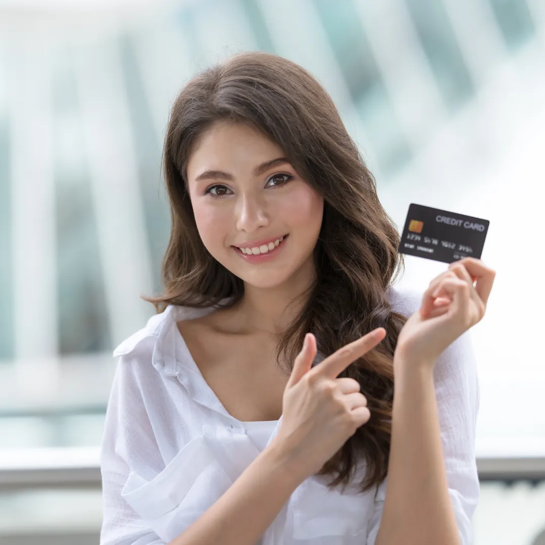 Woman Holding Credit Card