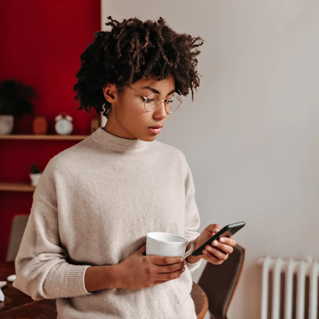 Woman looking at phone intently