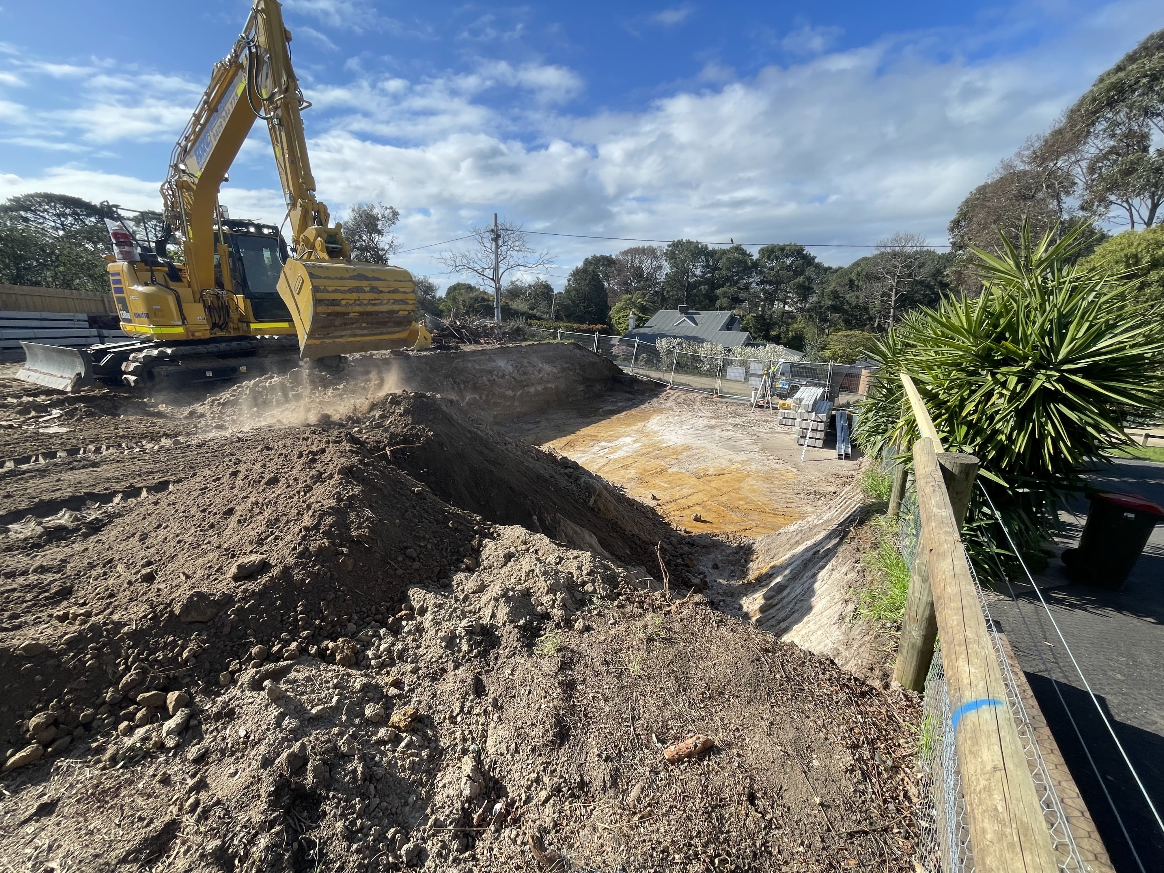 Wide shot showing the scale of excavation and the 800+ cubic metres of spoil removal