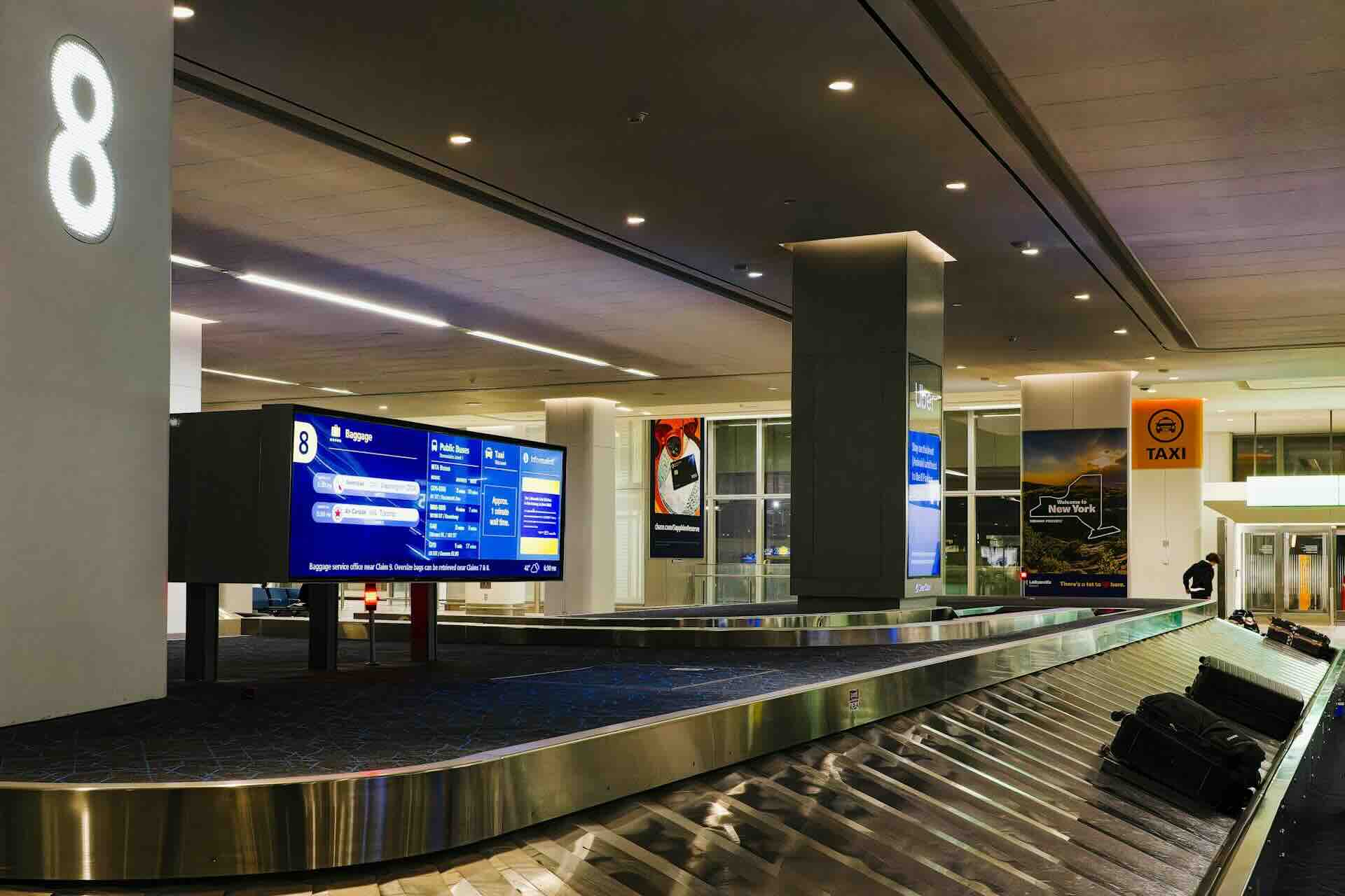 An airport baggage claim carousel