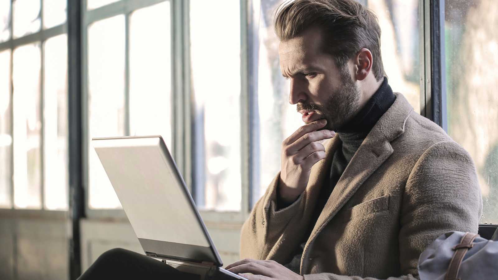 Man in front of laptop 