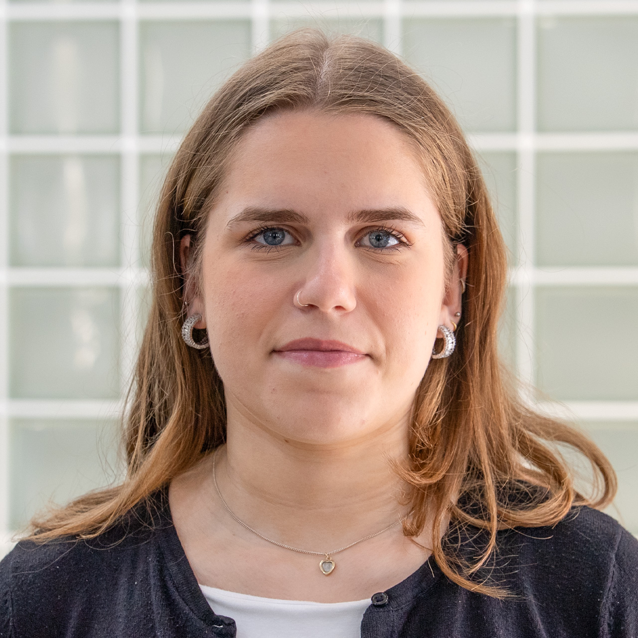 Headshot of smiling receptionist Lily Walker. 