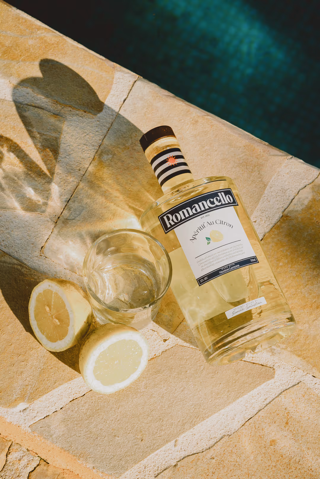 Romancello lemon aperitif served poolside at a summer gathering