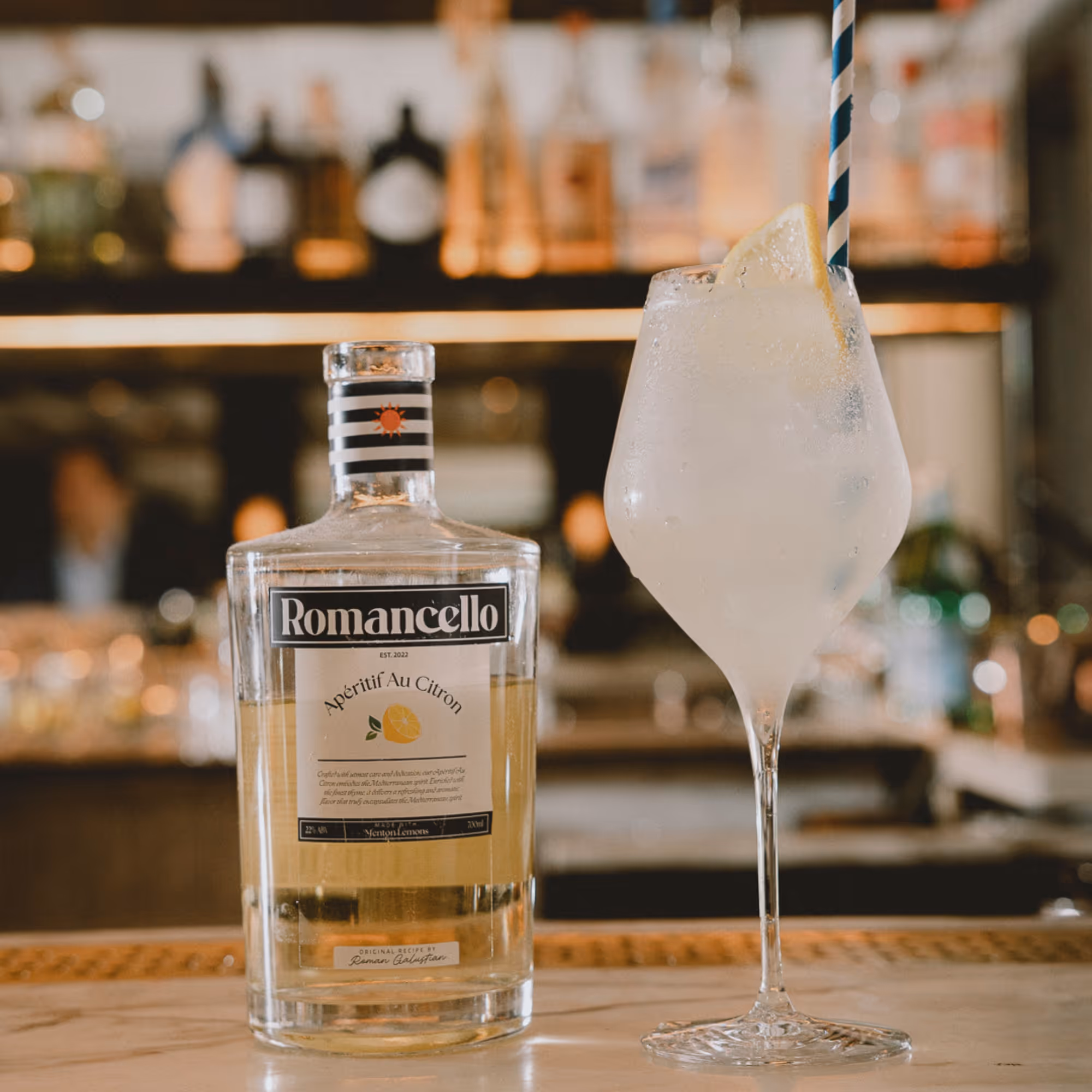Romancello Spritz cocktail — lemon aperitif with soda water and lemon wheel