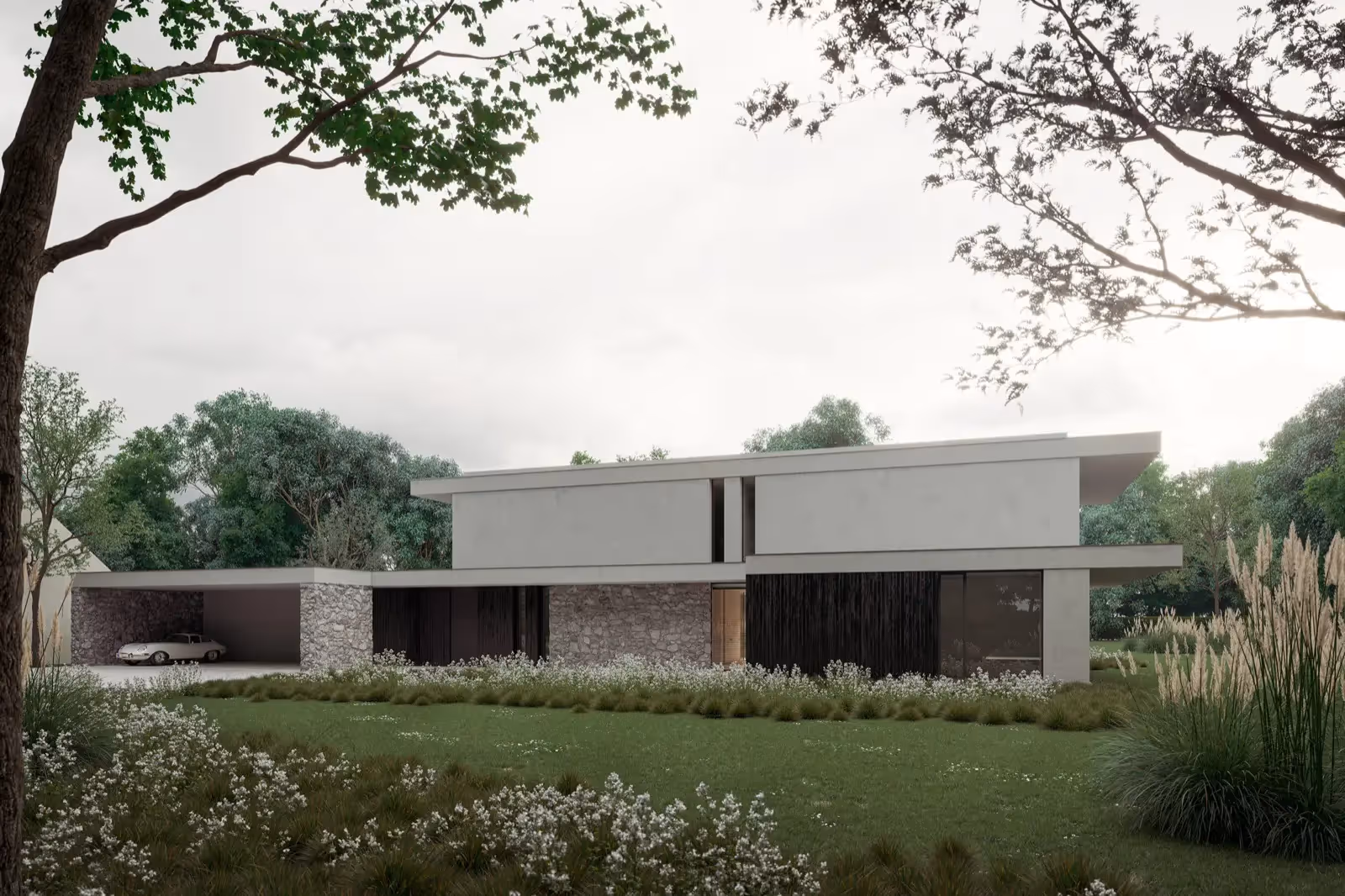 Modernistische villa met een vlak dak en een combinatie van witte stucwerk en natuurstenen muren, met een autoport in een natuurlijke omgeving.