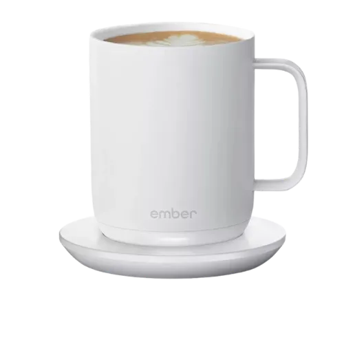 White Ember smart mug with heated base and coffee inside