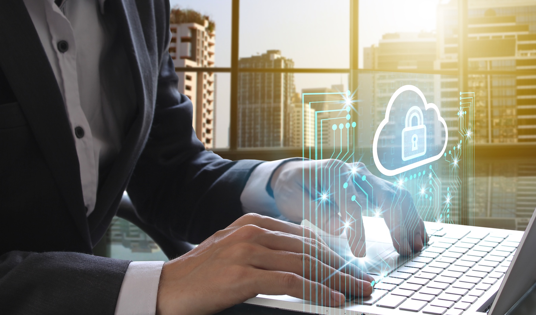 Person's hand reaching toward a screen to log into a private cloud interface.