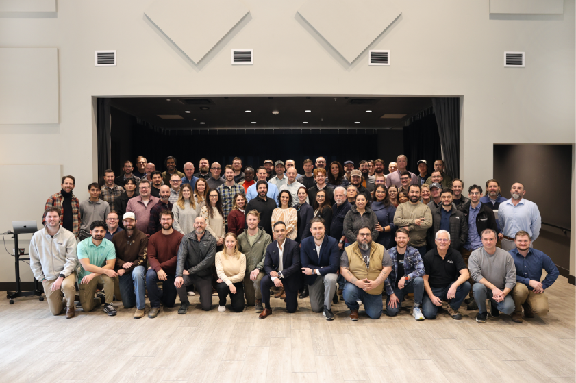 A group of people posing for a photoAI-generated content may be incorrect.