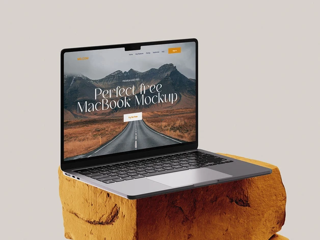 A temporary case study stock image showing a square block of natural stone and laptop showing a mock website. Full case studies coming soon.