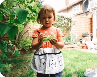 Child wearing the apron