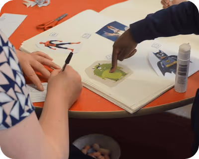 Kids play with the big book