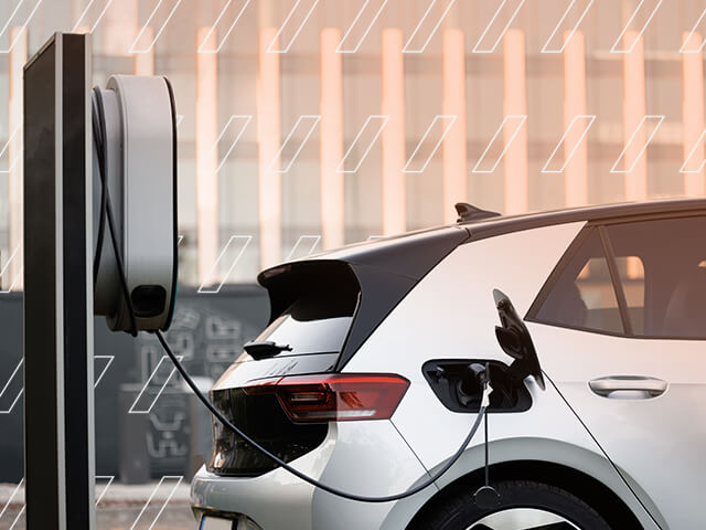 An EV at a charging station. 