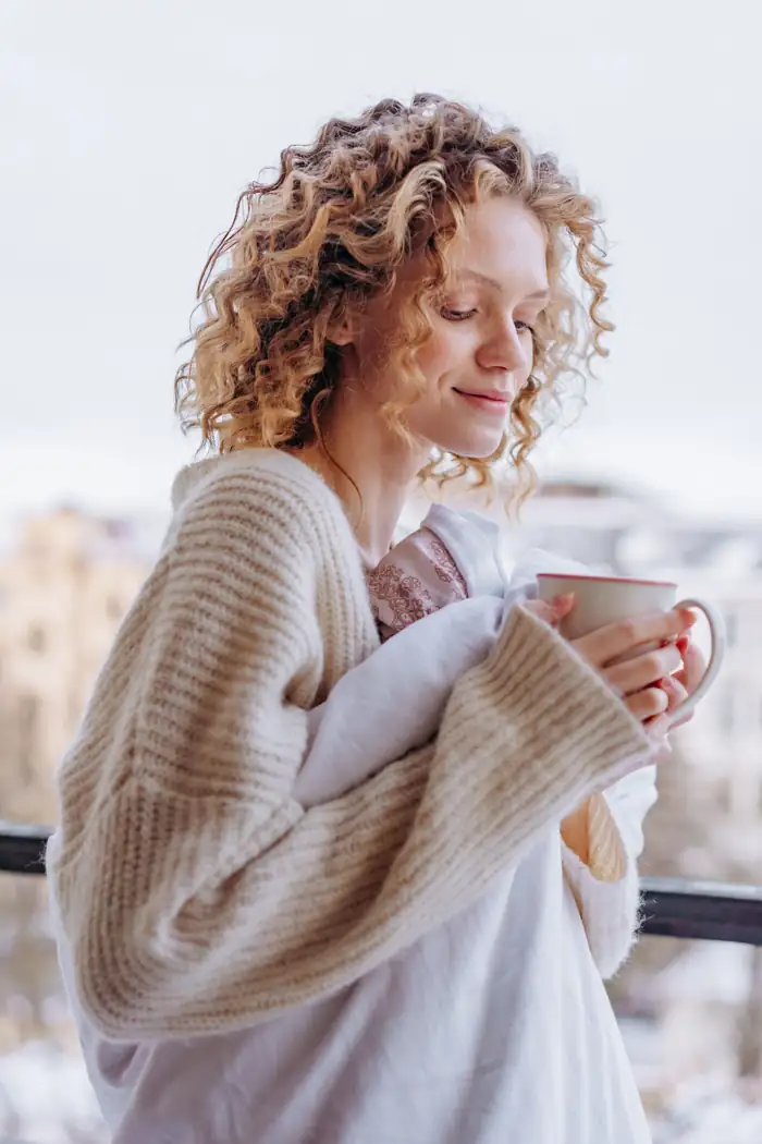 Woman relaxing with a cup of tea