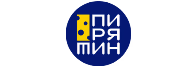 Logo of ‘Пирятин’ (Piryatin), a Ukrainian dairy brand. The design features the brand name in bold white Cyrillic letters inside a dark blue circle, with a stylized yellow cheese block integrated into the typography.