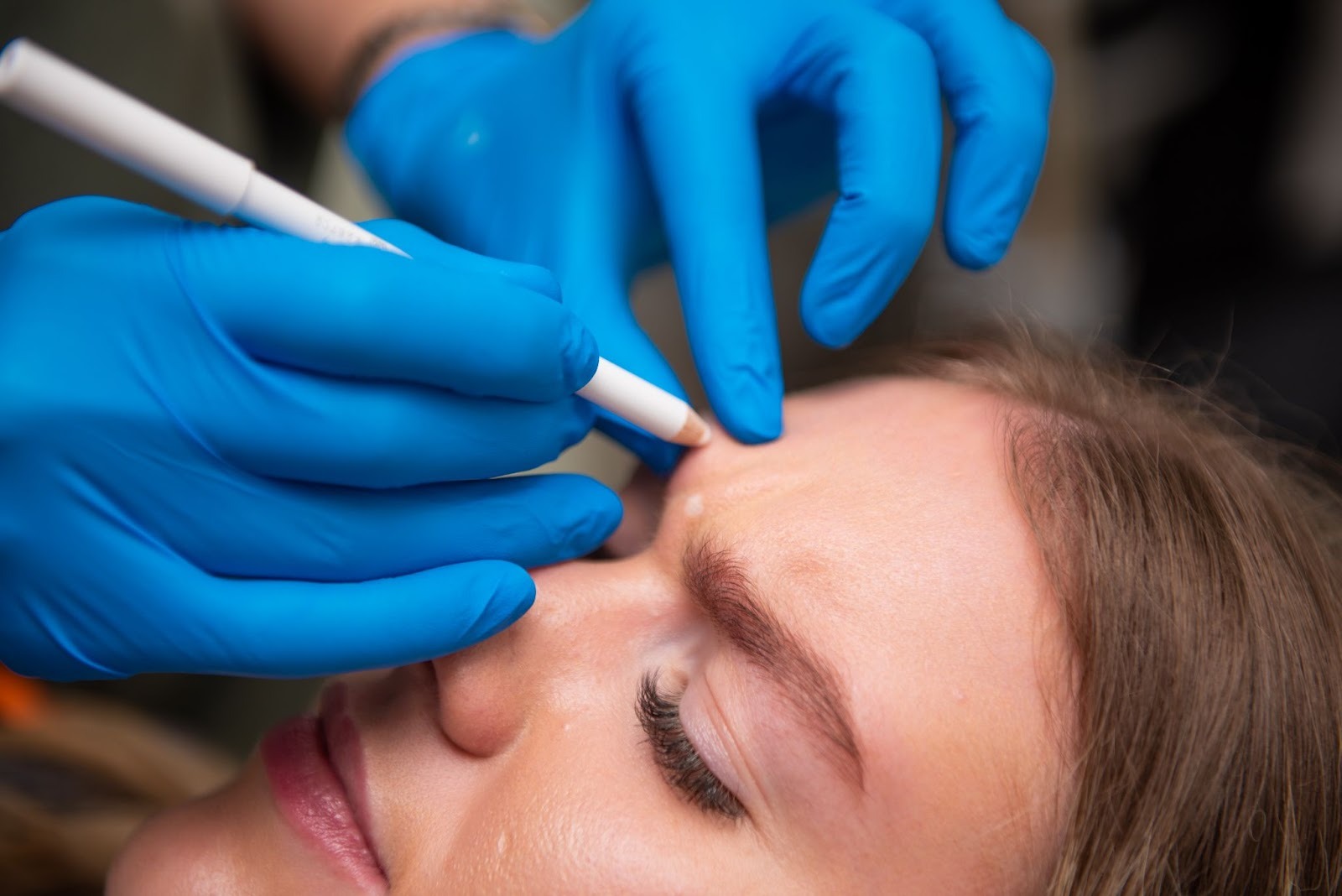 Clinician preparing for facial aesthetics treatment at Feel Good Dental Croydon