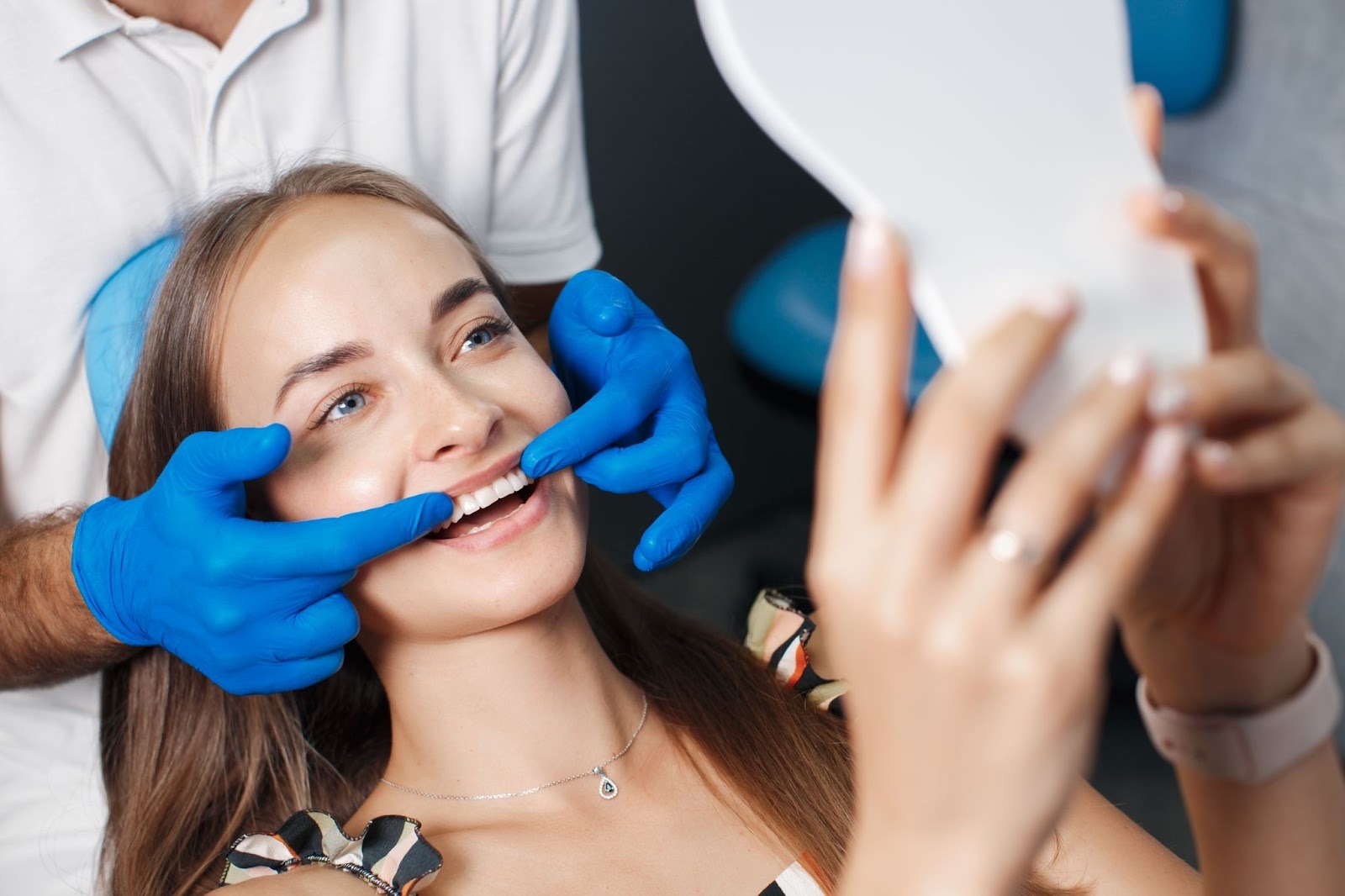 Patient smiling in dental chair during cosmetic consultation at Feel Good Dental Croydon