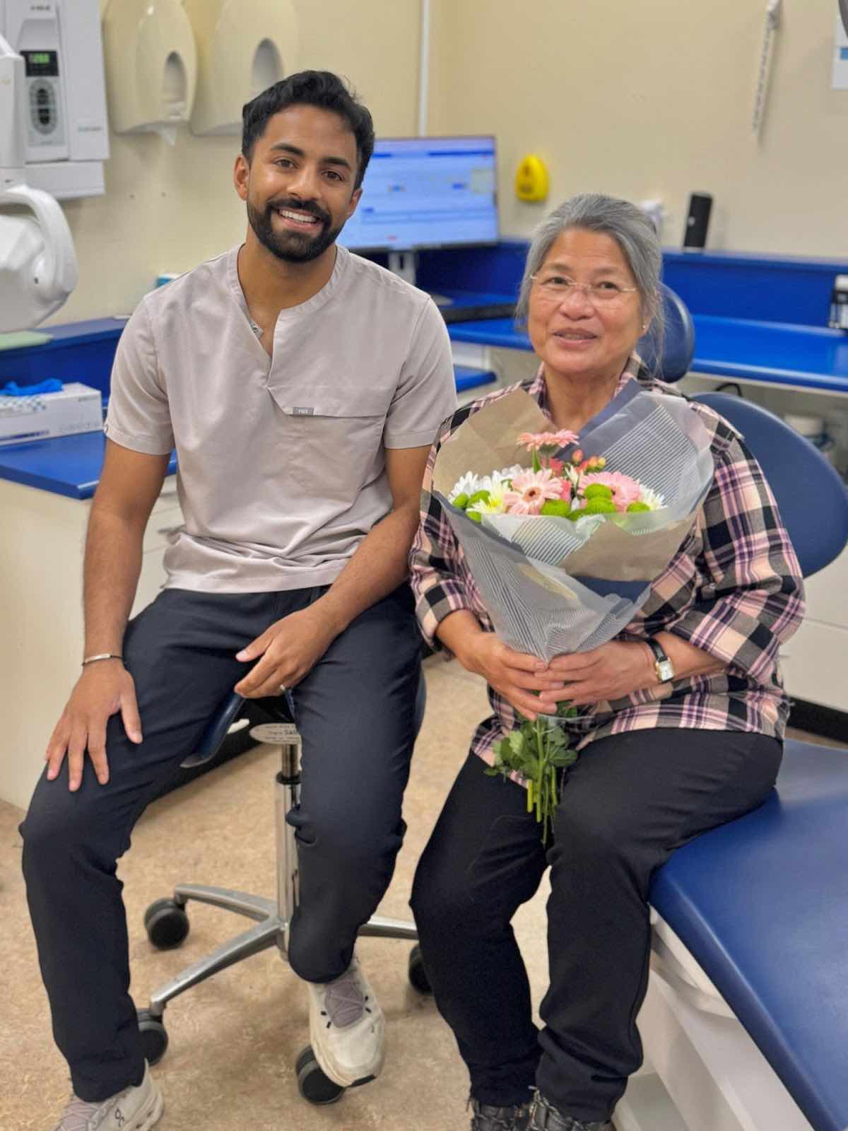 Purley dentist with happy patient after dental implants at Foxley Lane Dental, serving Kenley and Addington