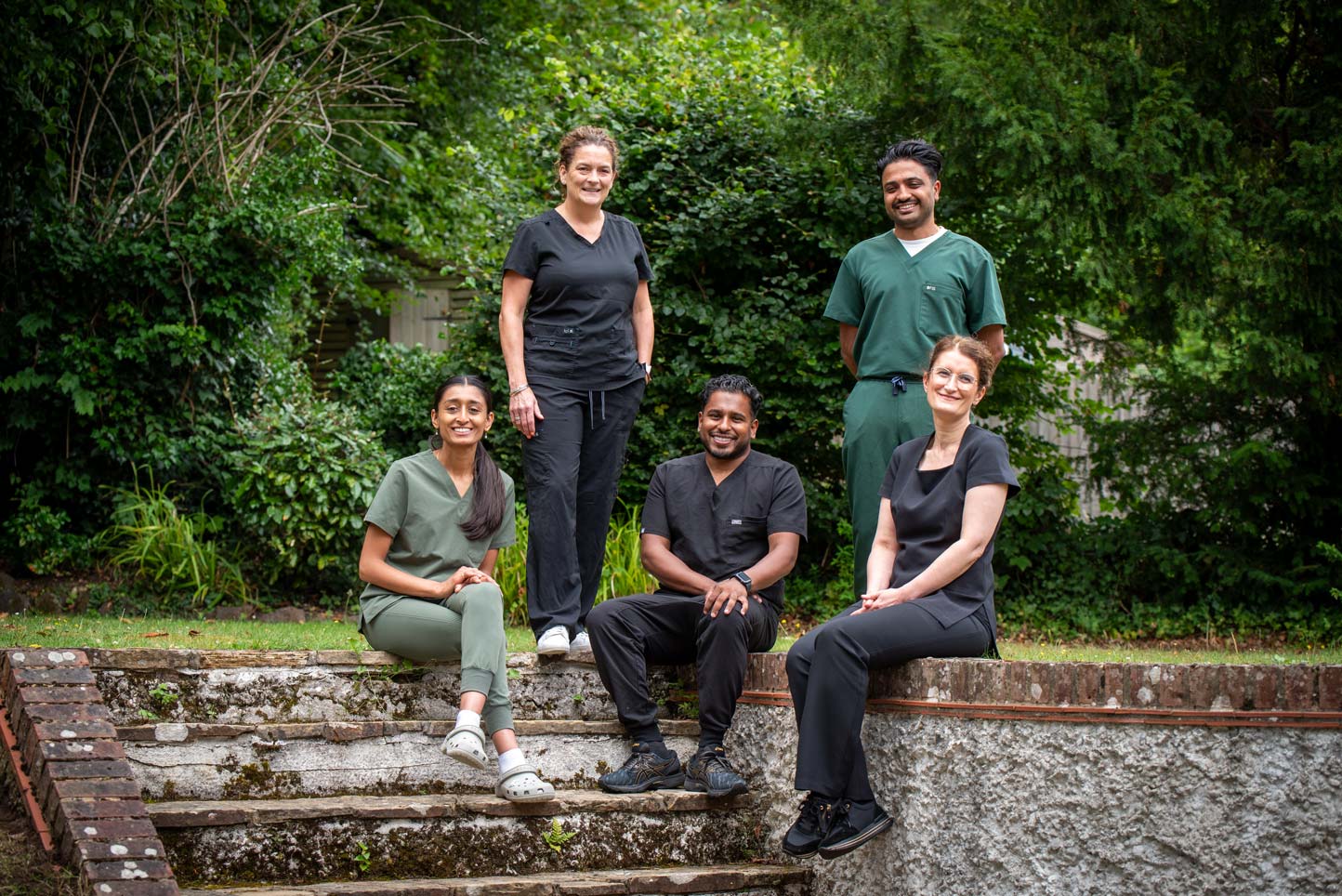 Older couple smiling after All-on-4 dental implants at Foxley Lane Dental, trusted Purley dentist near Coulsdon and Croydon