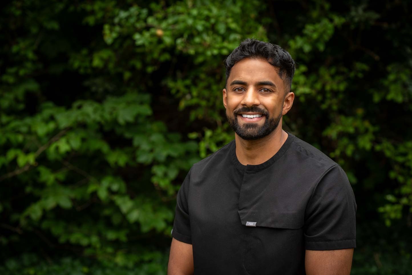 Dr Nev Jeyakumar, experienced dental implant dentist at Foxley Lane Dental in Purley