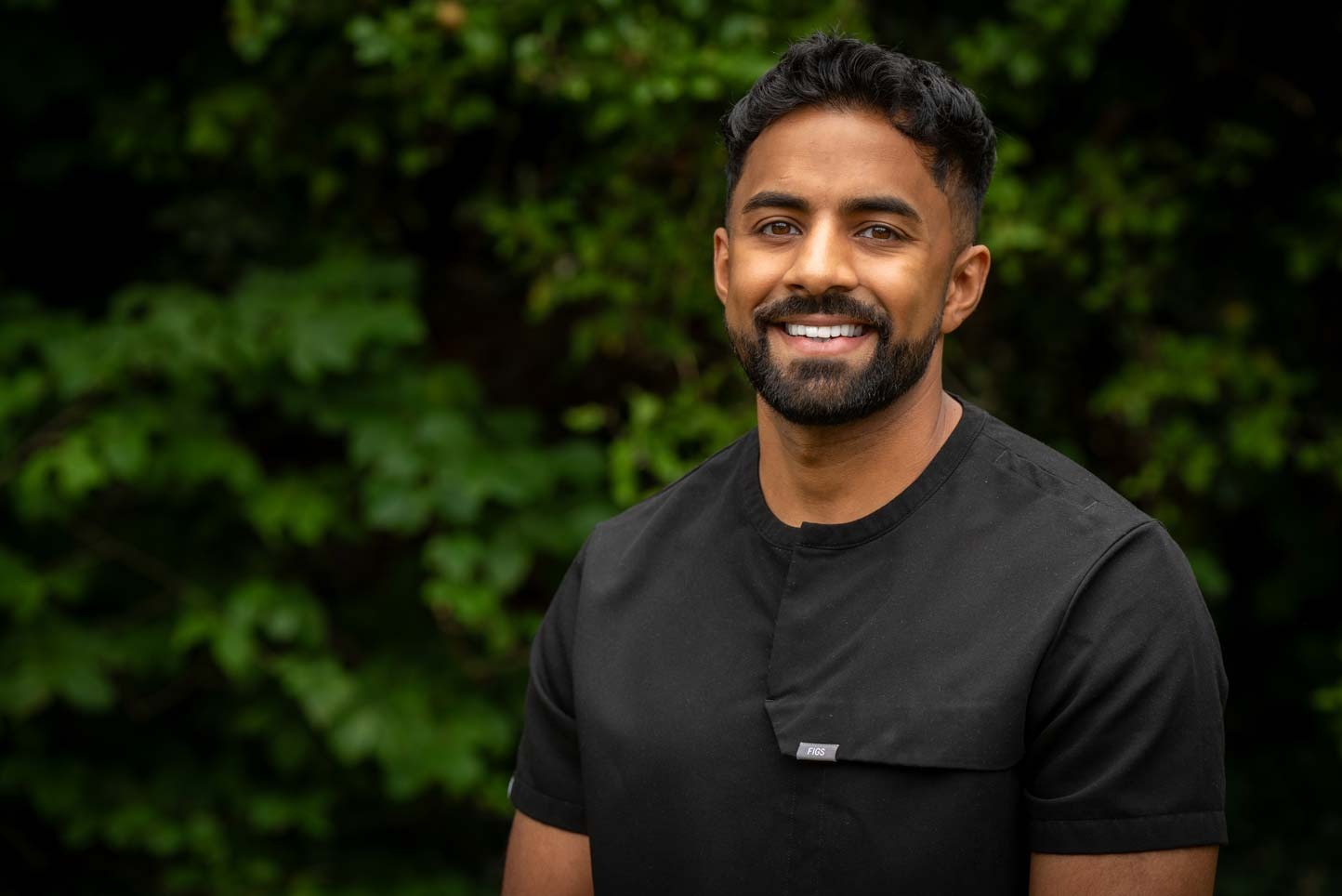 Experienced implant dentist Dr Nev at Foxley Lane Dental Care in Purley specialising in dental implants and restorative dentistry